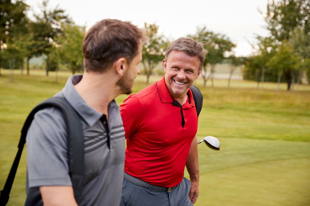 Sharing a joke on the golf course